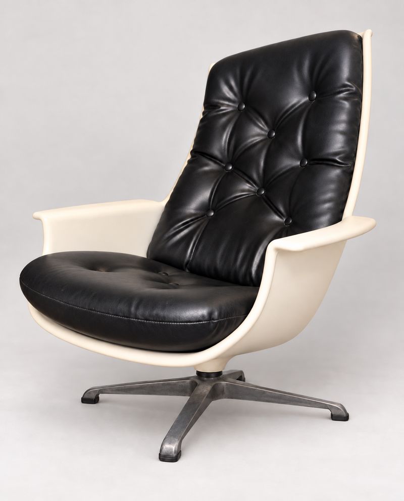 White Shell Swivel Lounge Chair with Black Tufted Upholstery
