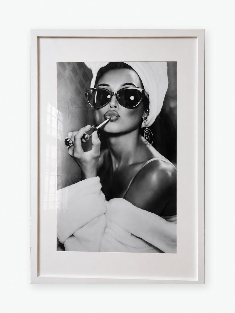 Woman Applying Lipstick — Black-and-White Photograph